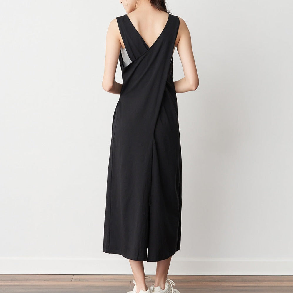 Elegant Cool Cotton Midi Dress with draped back for day-to-evening transitions.