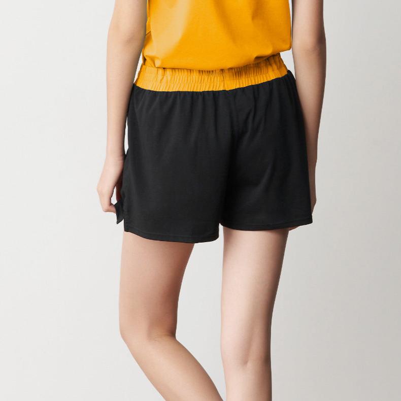 Stylish women's cool cotton shorts with contrast waistband and lightweight, wrinkle-resistant fabric.