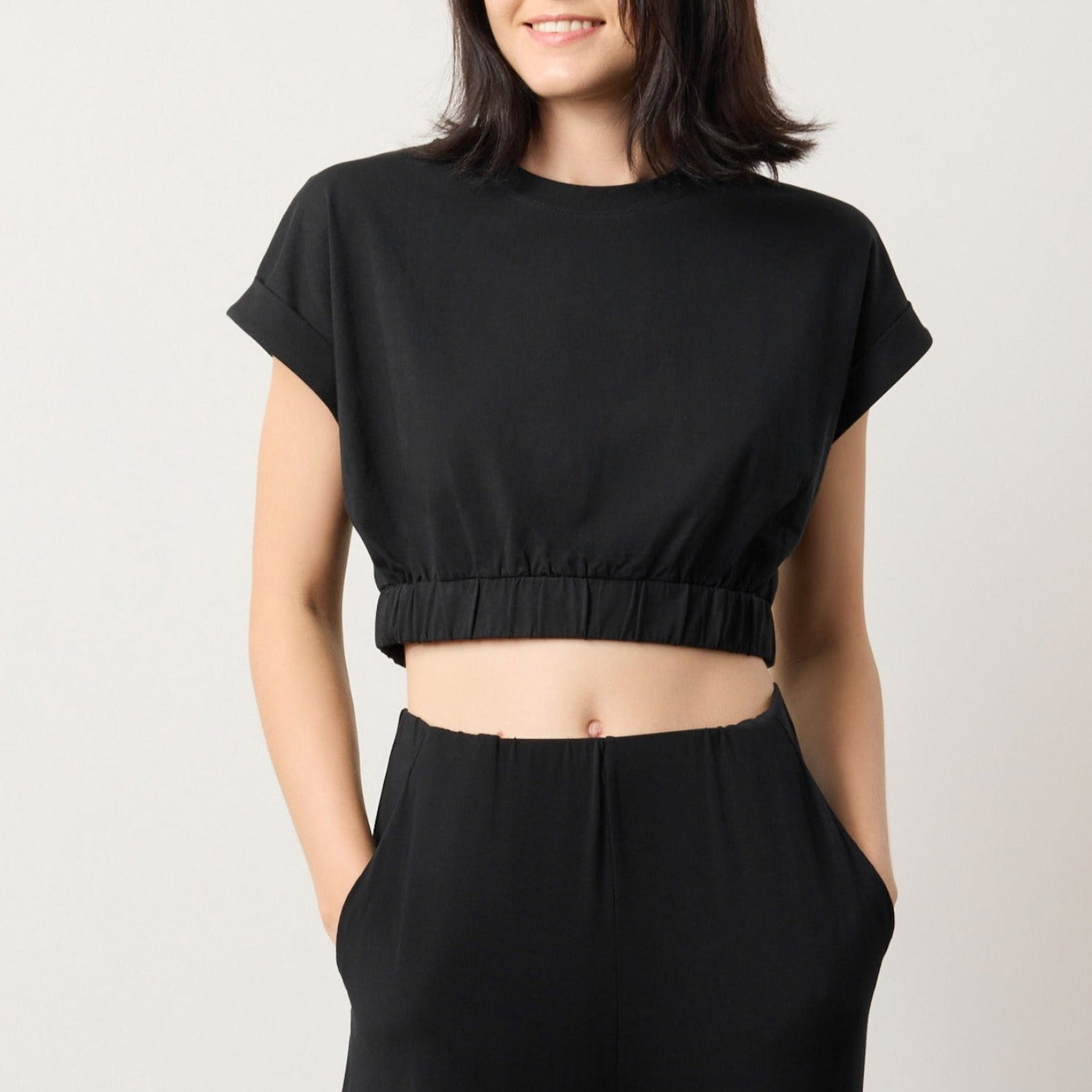 Cool Cotton Cap Sleeve Crop Top in breezy fabric, perfect for effortless chic style.
