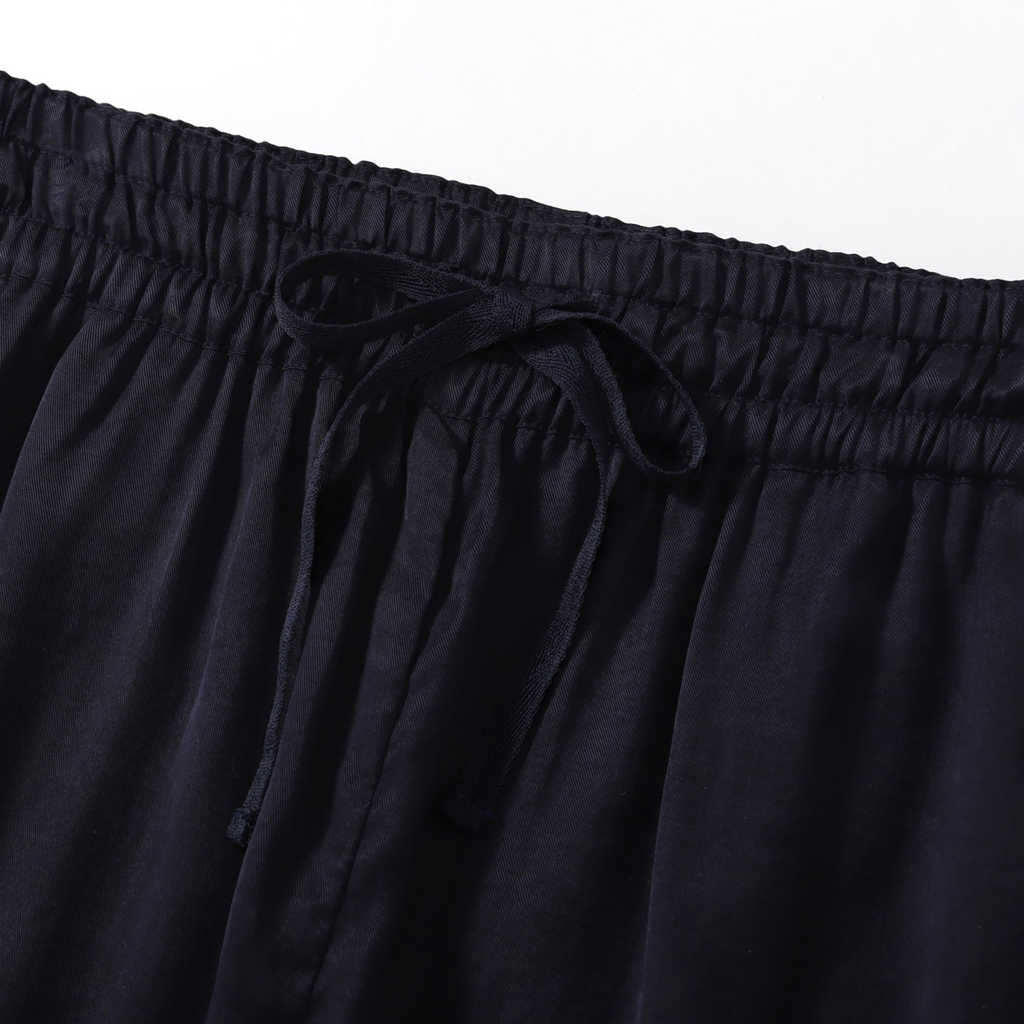 Flow TENCEL™ LUXE shorts with elastic waistband, featuring soft, lightweight, and eco-friendly fabric.