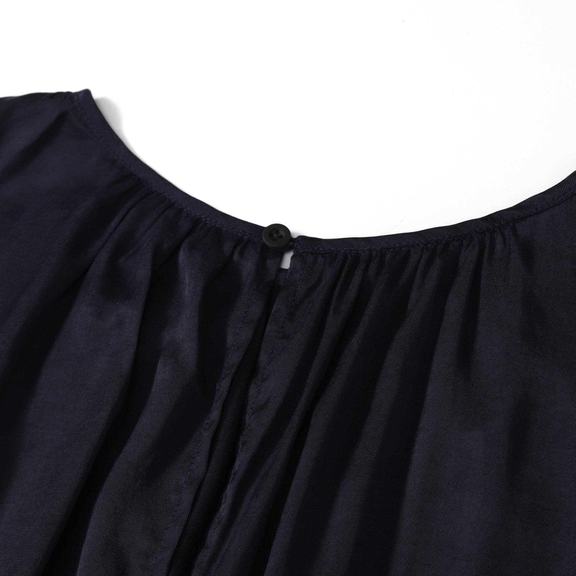 Flow TENCEL™ LUXE puffed sleeve maxi dress, eco-friendly, elegant, and lightweight with soft pleats.