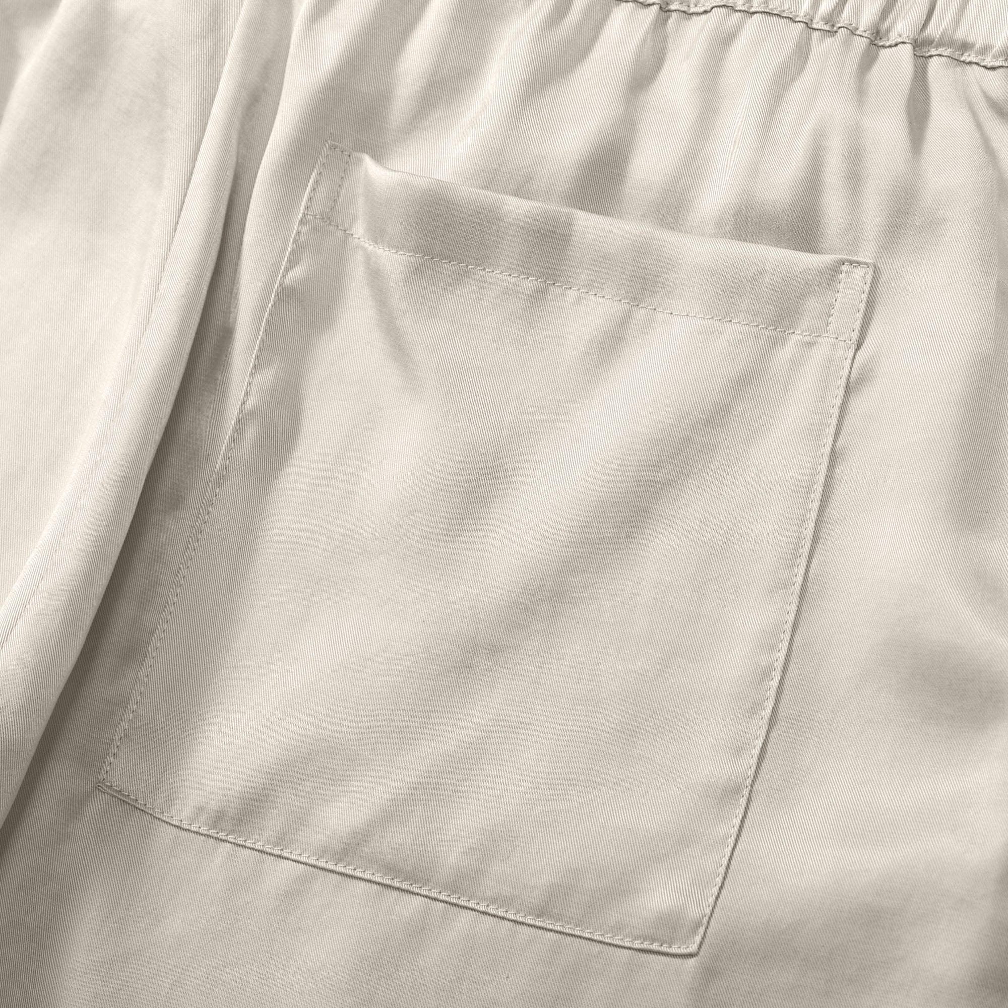 Flow TENCEL™ LUXE Shorts with elastic waistband, eco-friendly, lightweight, silky sheen.