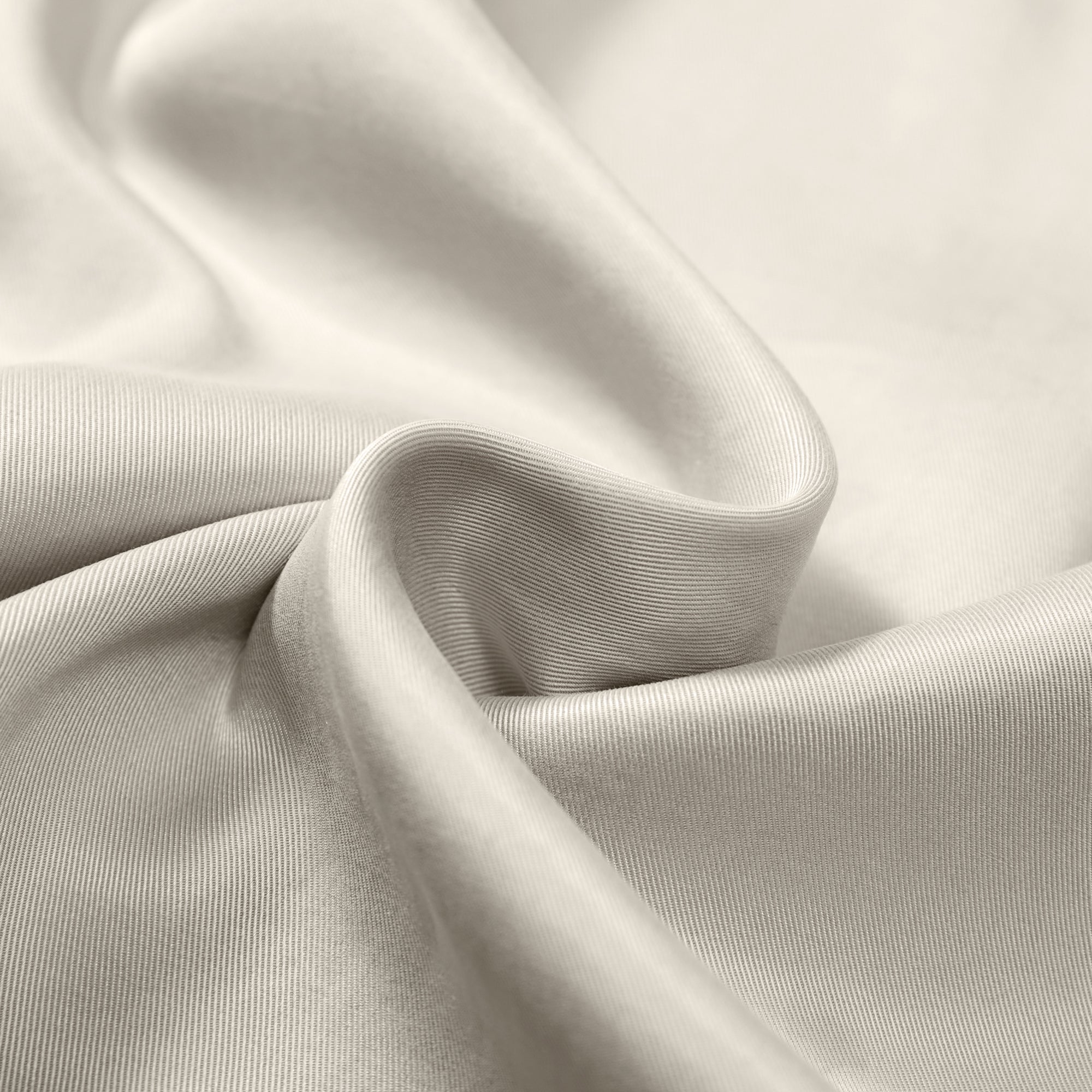 Elegant Flow TENCEL™ LUXE maxi dress with puffed sleeves and soft pleats, eco-friendly fabric.
