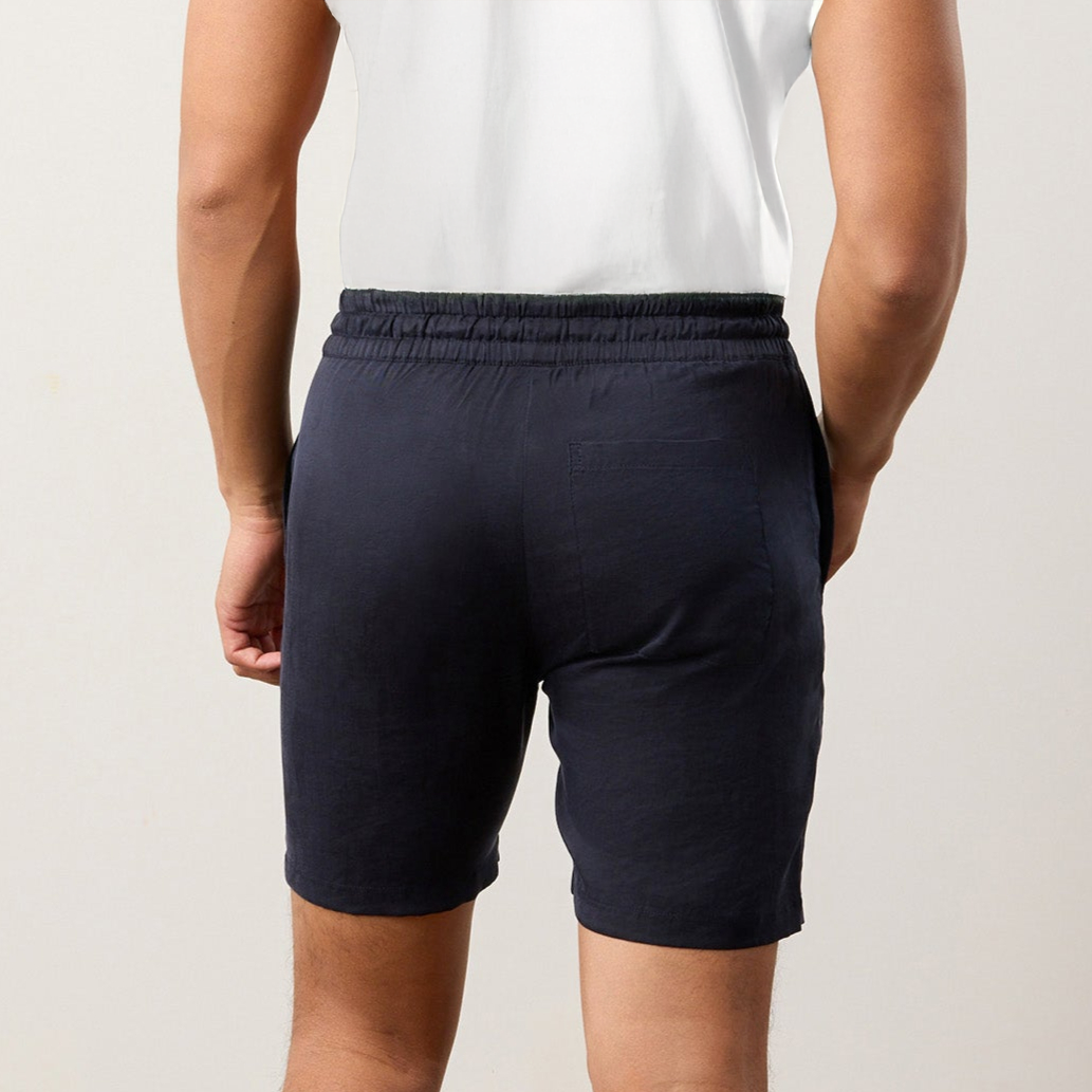 Lustrous Flow TENCEL™ LUXE shorts with elastic waistband, eco-friendly and lightweight design.