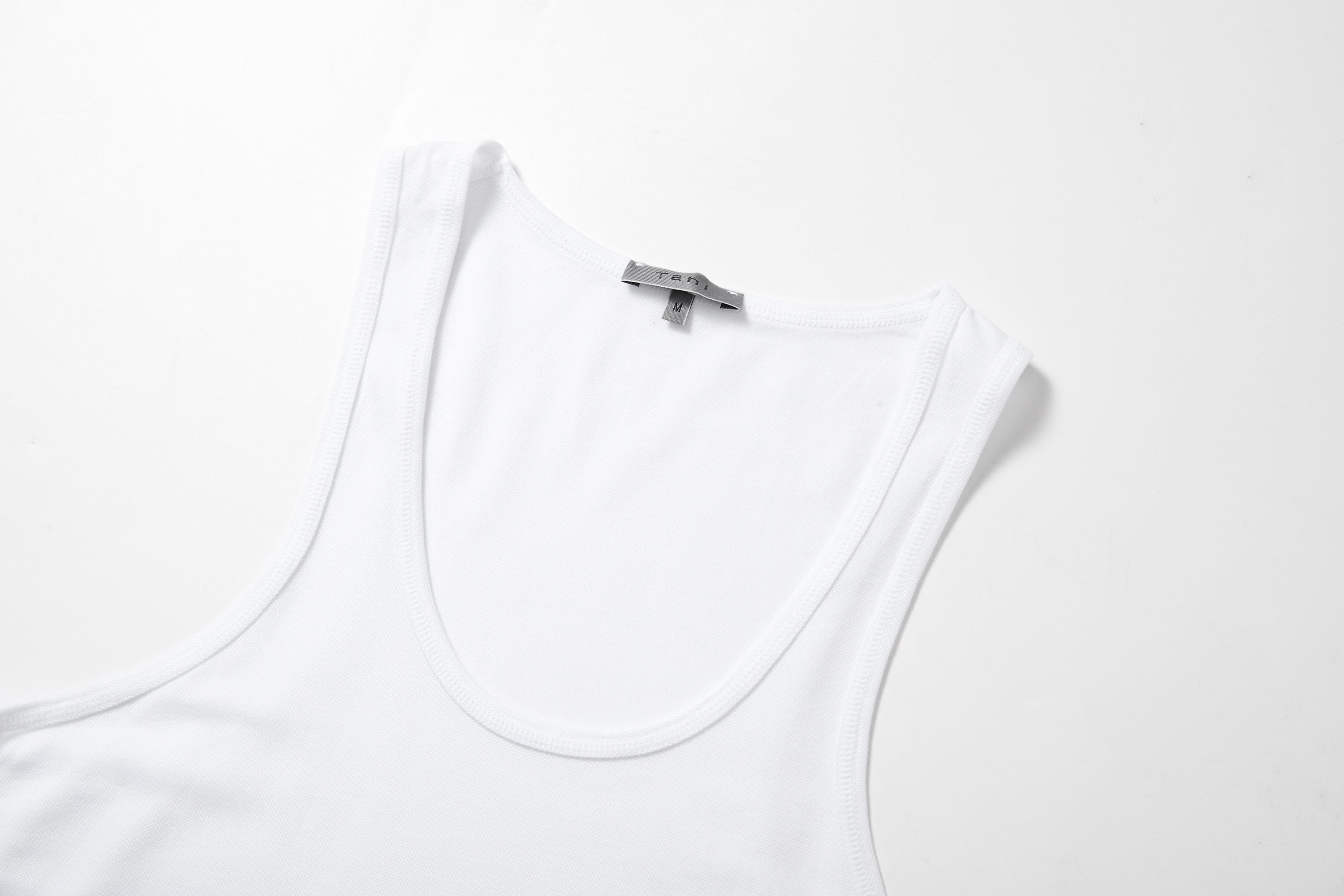 Active TENCEL™ Lyocell tank top in breathable 3D pique knit for comfort and performance.