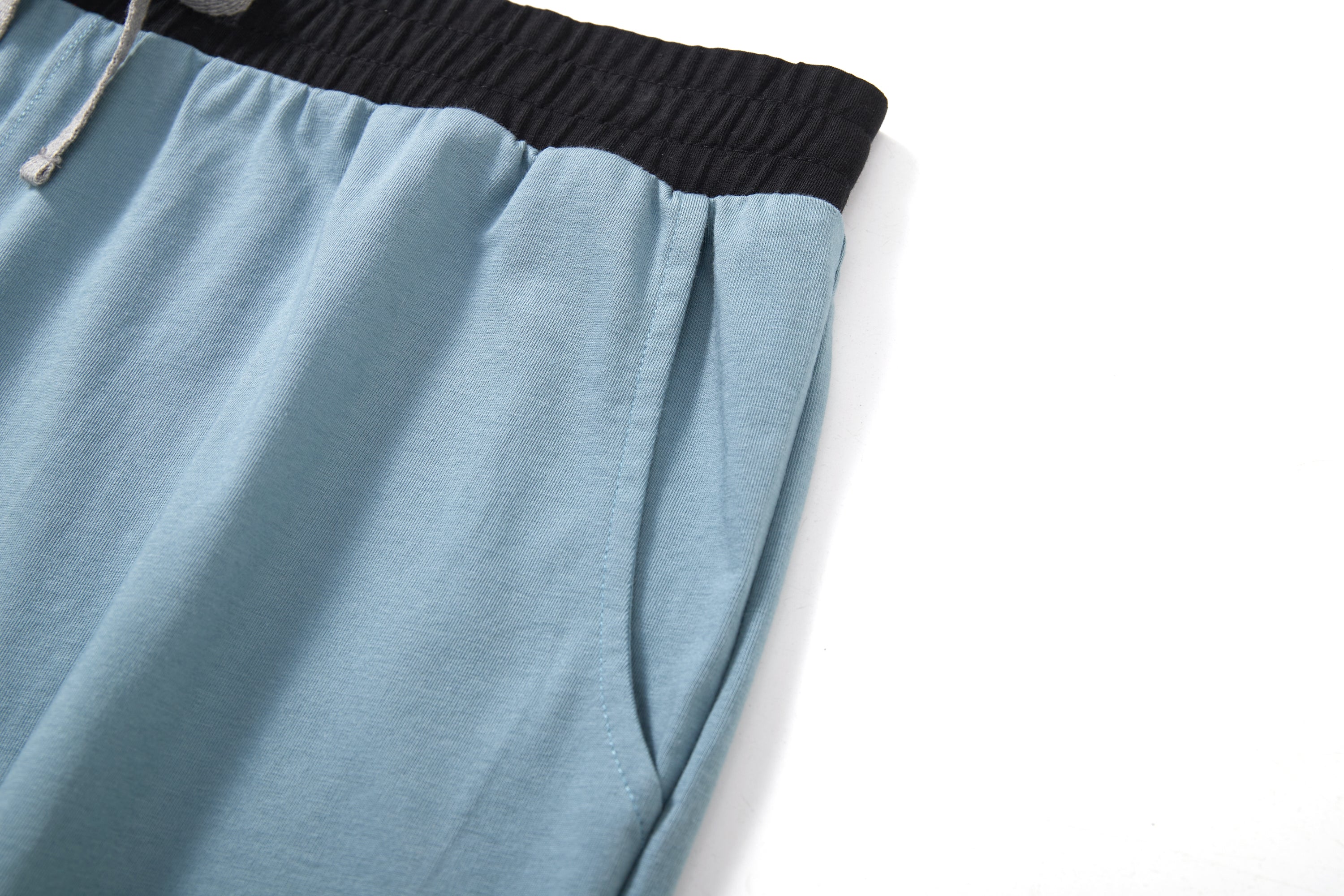 Cool Cotton Shorts with contrasting waistband, lightweight, wrinkle-resistant, eco-friendly design.