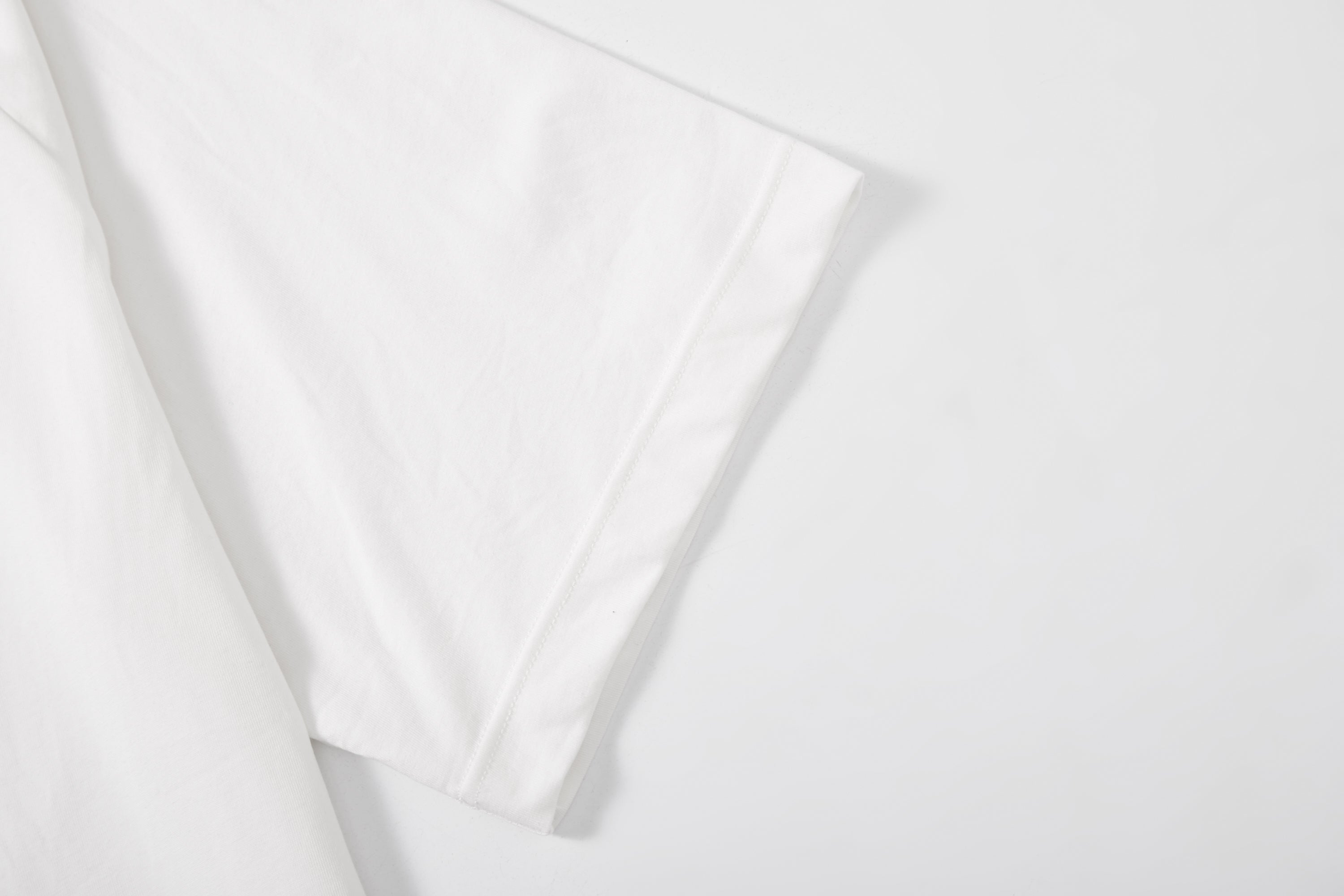 Men's Cool Cotton Oversized Tee in lightweight fabric for relaxed, contemporary style.